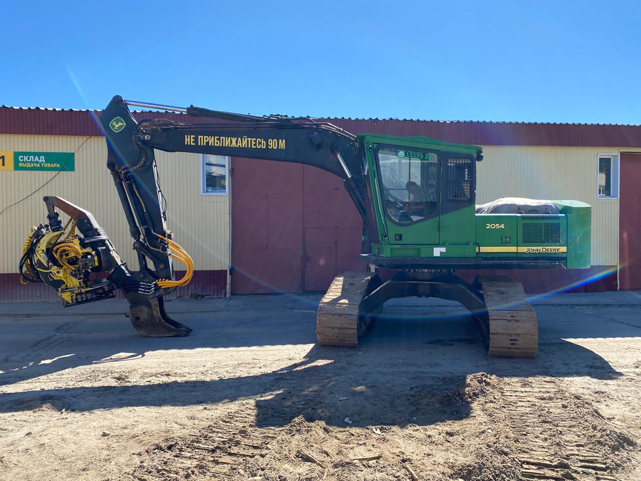 JOHN DEERE лесопогрузчик гусеничный 2054